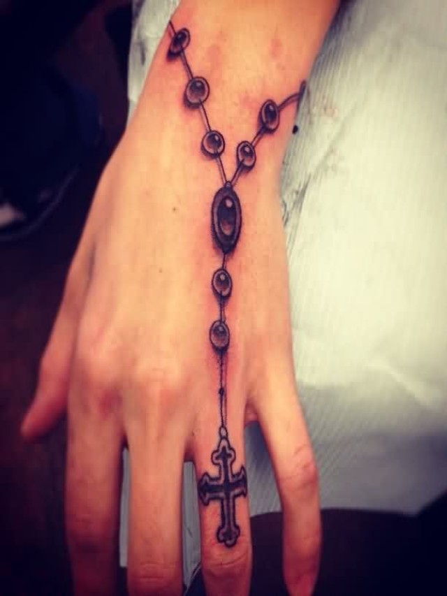 Lista 96+ Foto pulsera tatuajes de rosarios en la mano El último