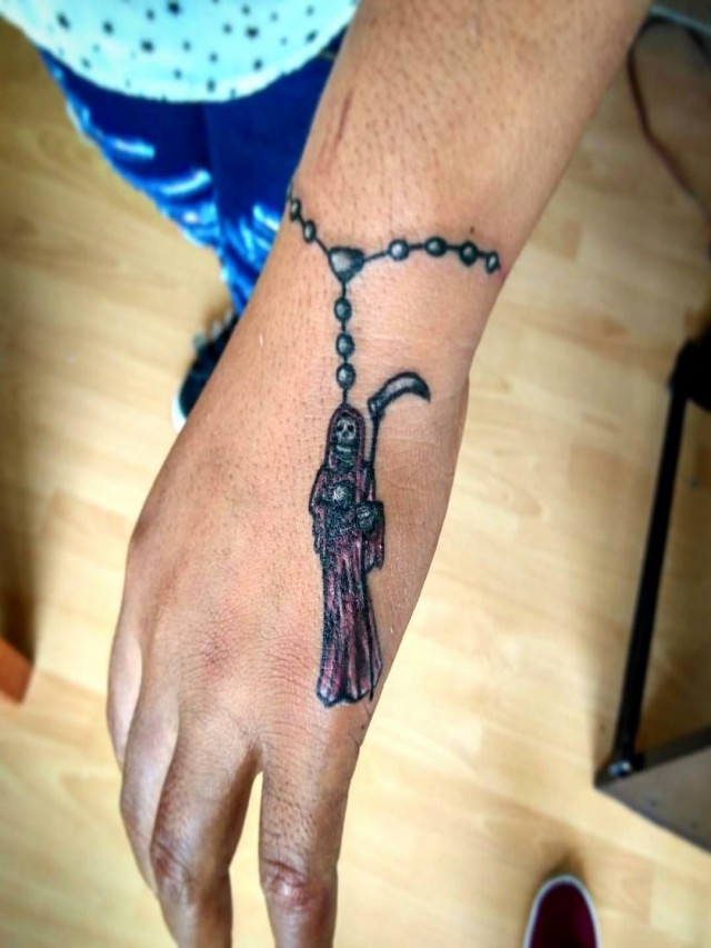 Álbumes 94+ Imagen tatuajes de la santa muerte con rosario El último