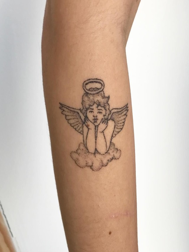 Lista 91+ Foto tatuajes de angeles tiernos para mujeres Mirada tensa