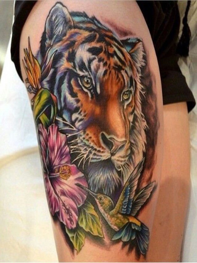 Arriba 102+ Foto tatuajes de tigres en la pierna para mujeres Mirada tensa